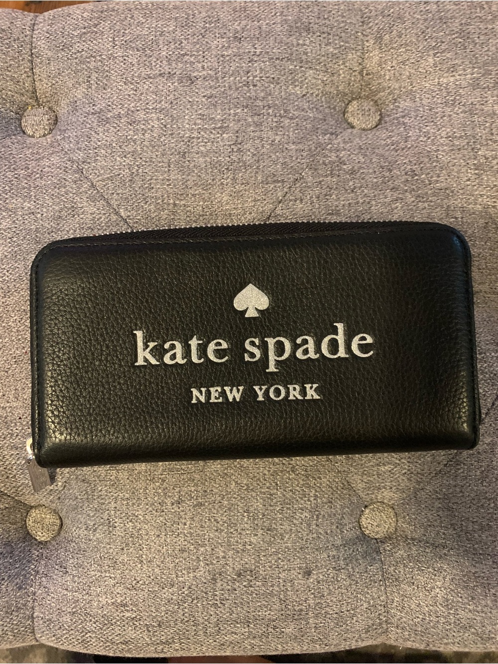 kate spade Black Pebbled Leather Zip Around Wallet with Silver Logo
